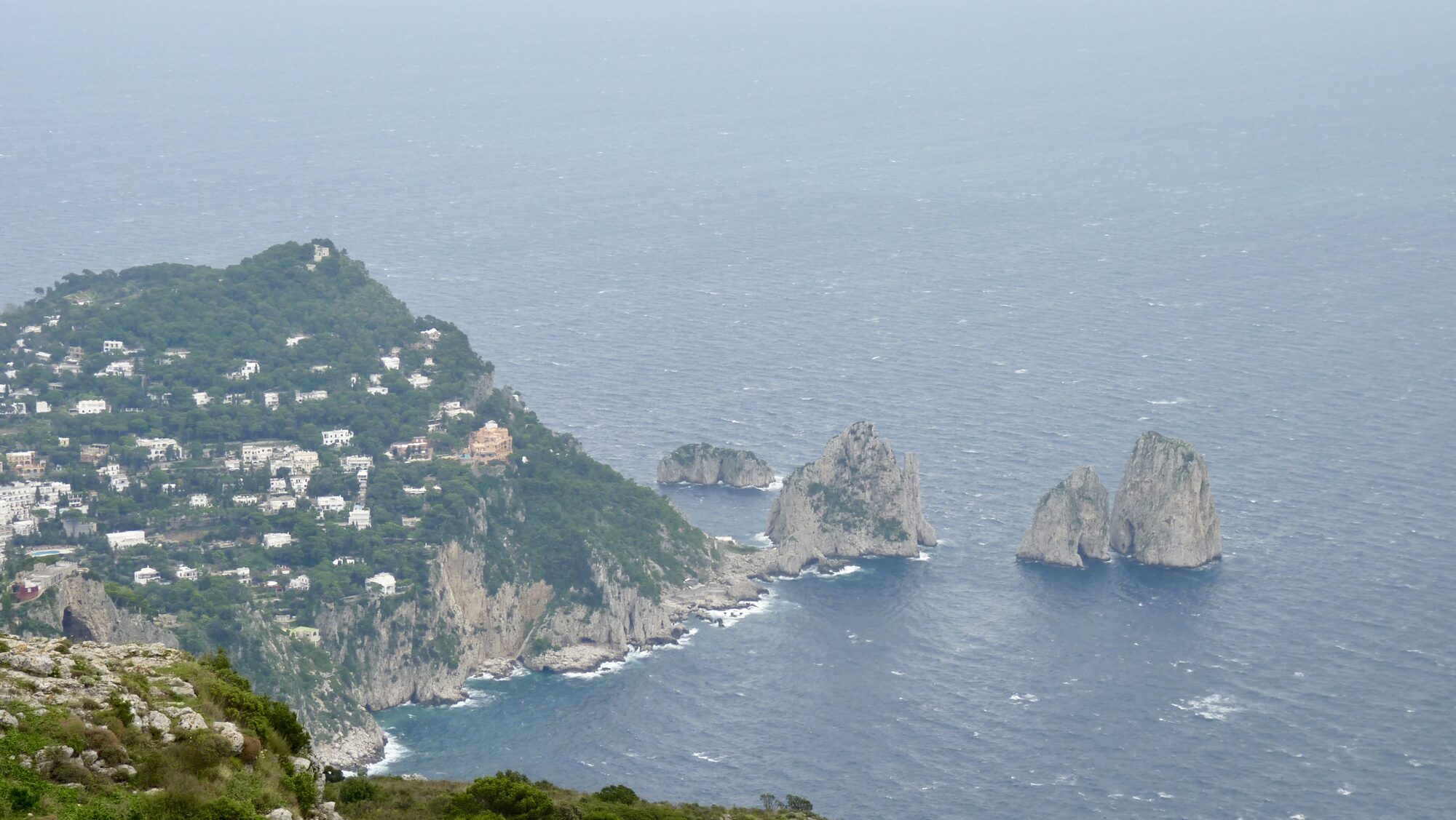 Capri’s coastline and the Faraglioni rocks rising from the sea