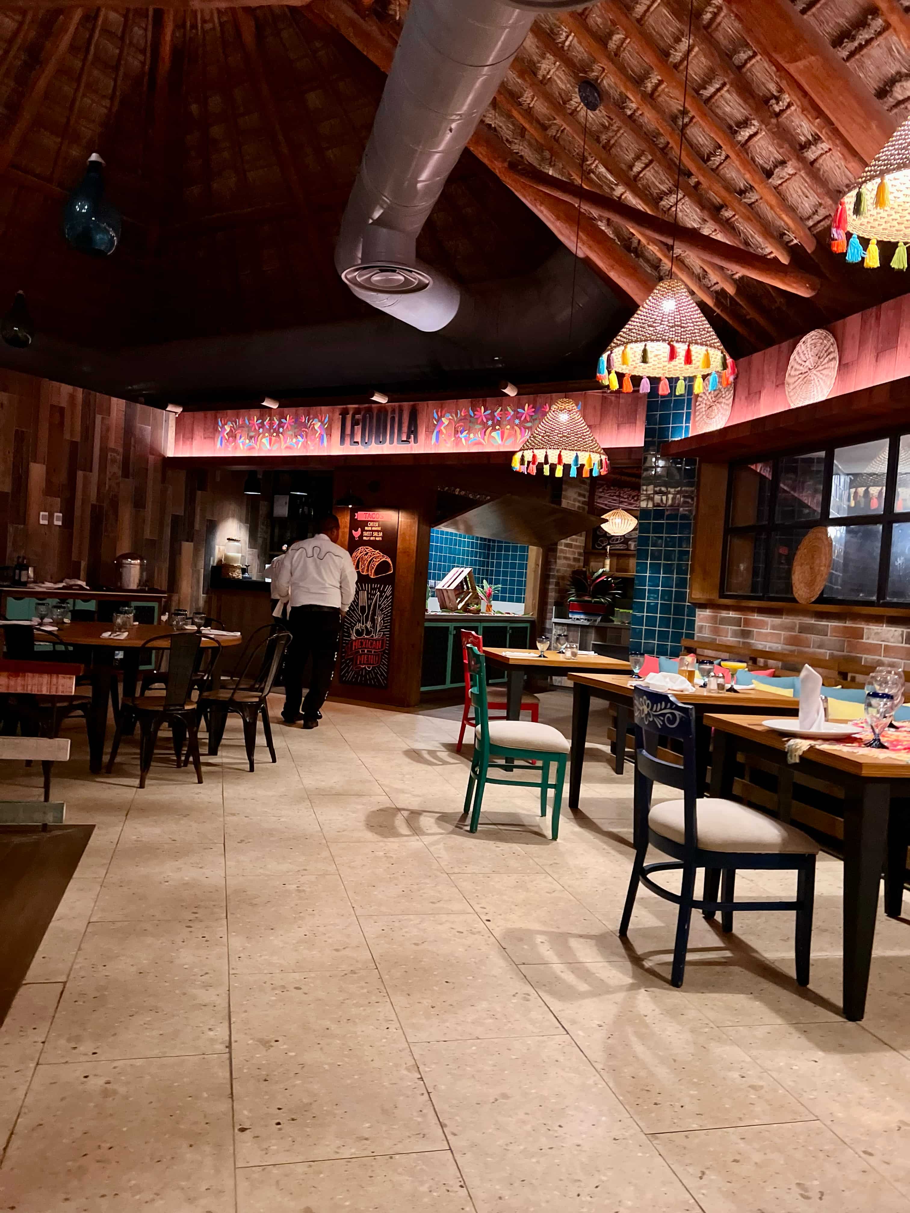 Mexican restaurant and matching cultural decor with thatched roof