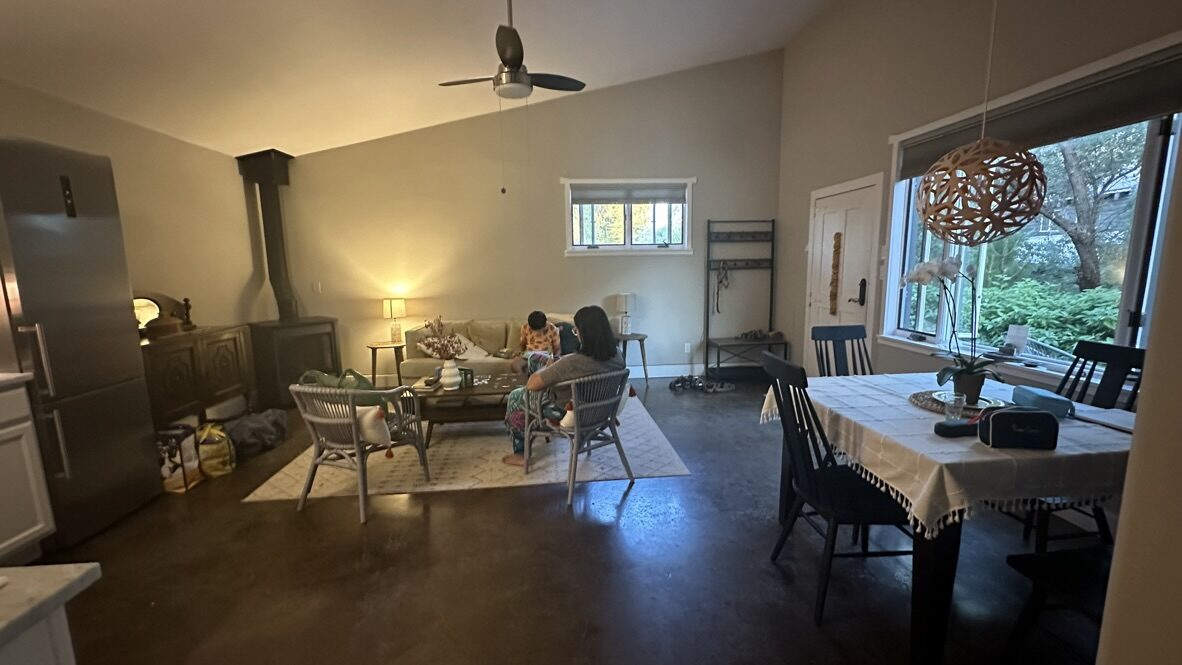 The bright living and dining room of our cabin in Taos